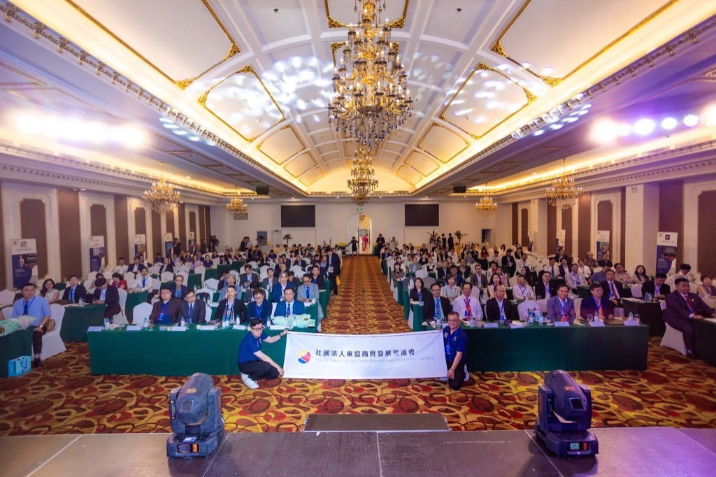 The Mira Hotel ballroom filled with VATIC 2026 attendees beneath its chandeliers, with the ACTA banner at the front of the stage.